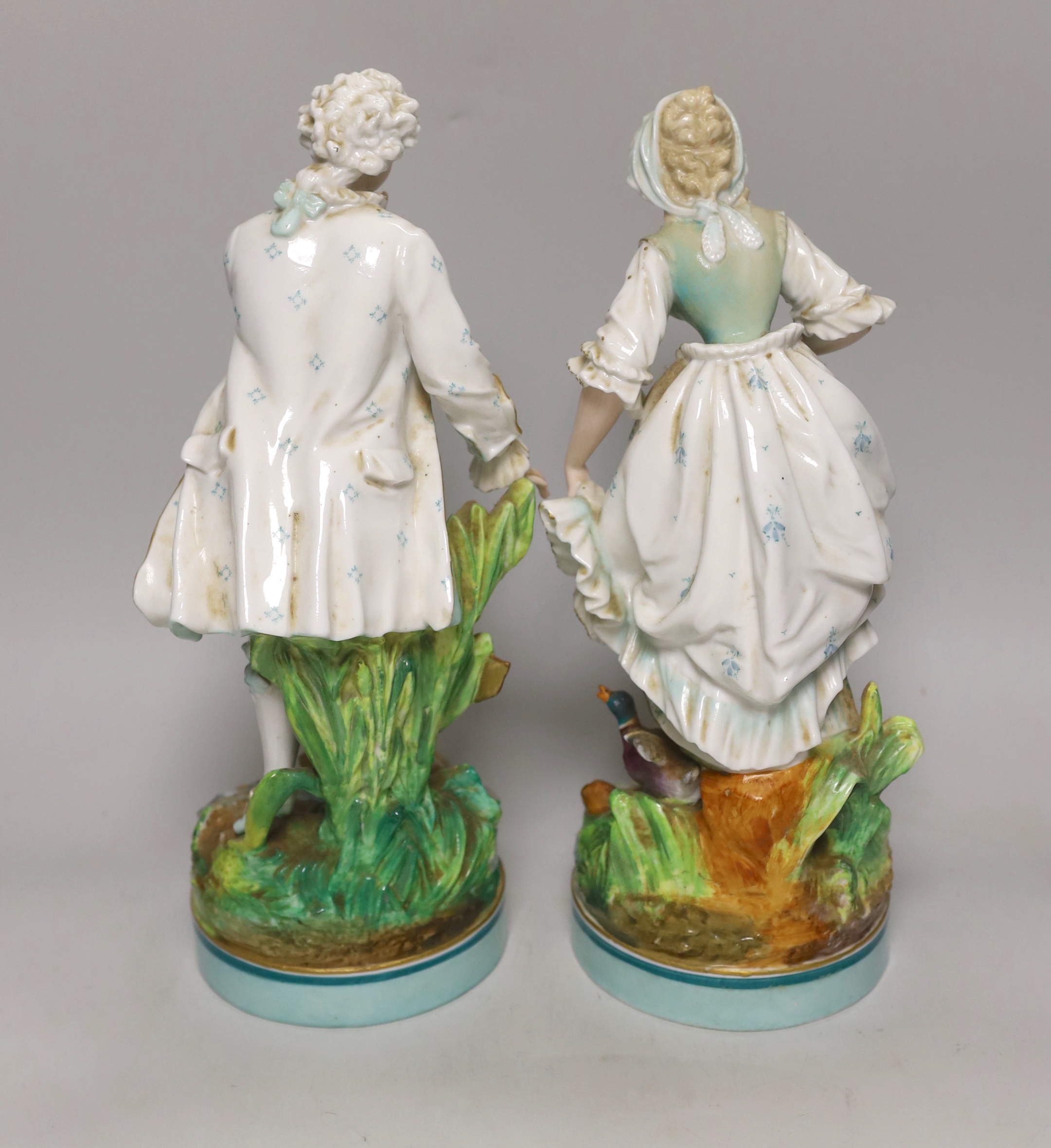 A pair of large French porcelain figures, late 19th century, 33cm tall